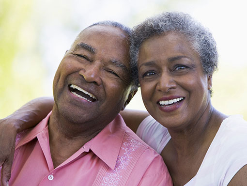 elderly couple smiling