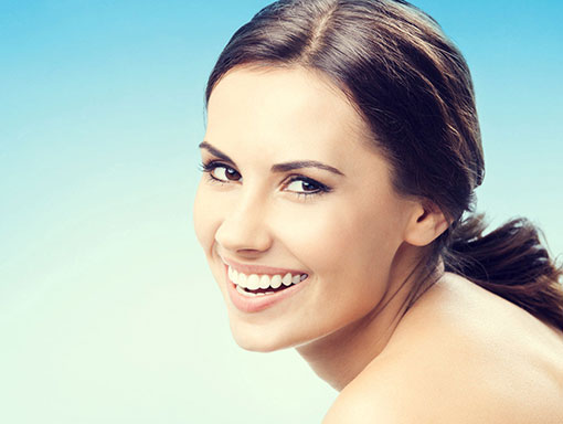 woman smiling (2) | Smiles Unlimited x-ray of a mouth full of teeth